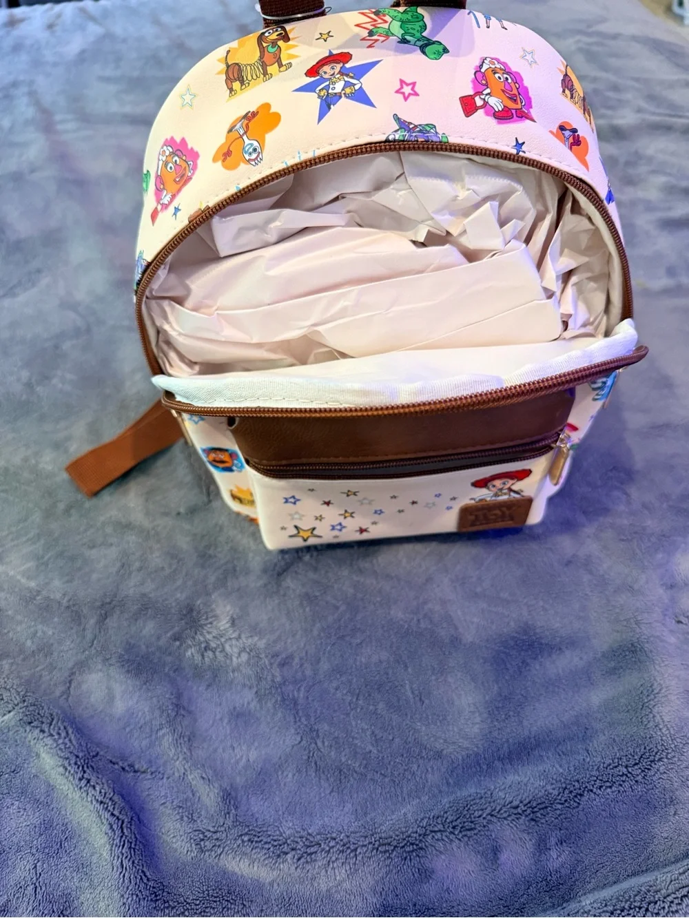 Disney Cream Toy Story Character Mini Backpack with Brown Trim